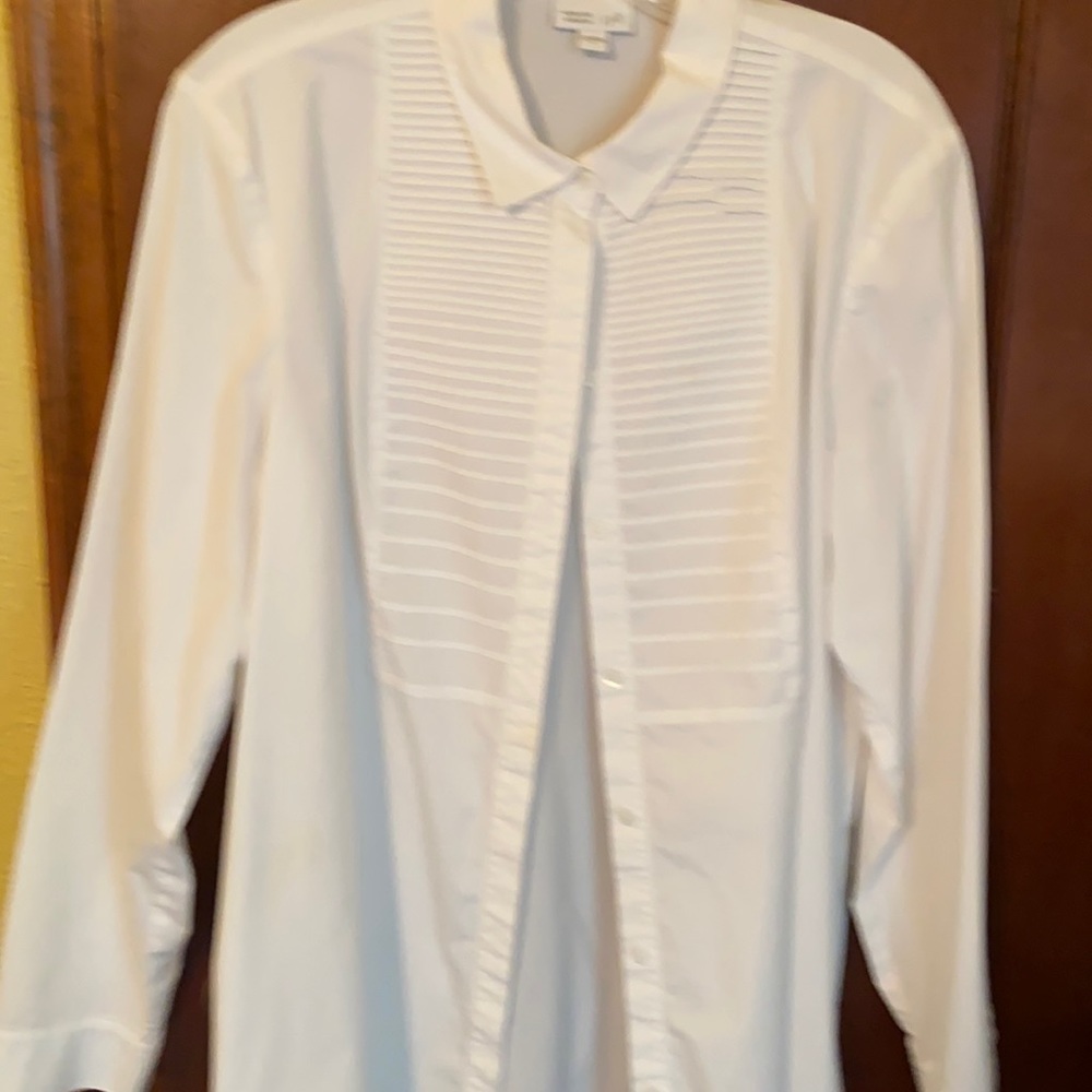 White shirt, tucks in front